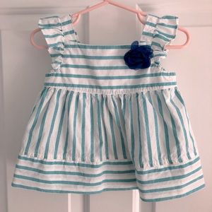 Gymboree girls striped shirt with floral decal.
